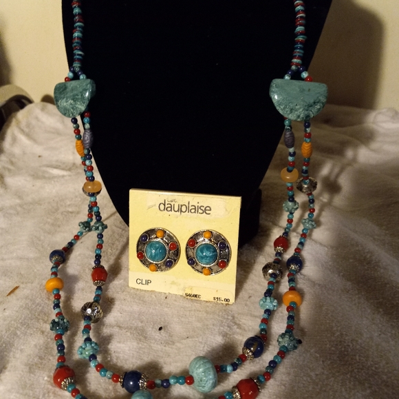 Used,not new multi colored mainly plastic 2strand necklace& matching clip ons. - Picture 4 of 4